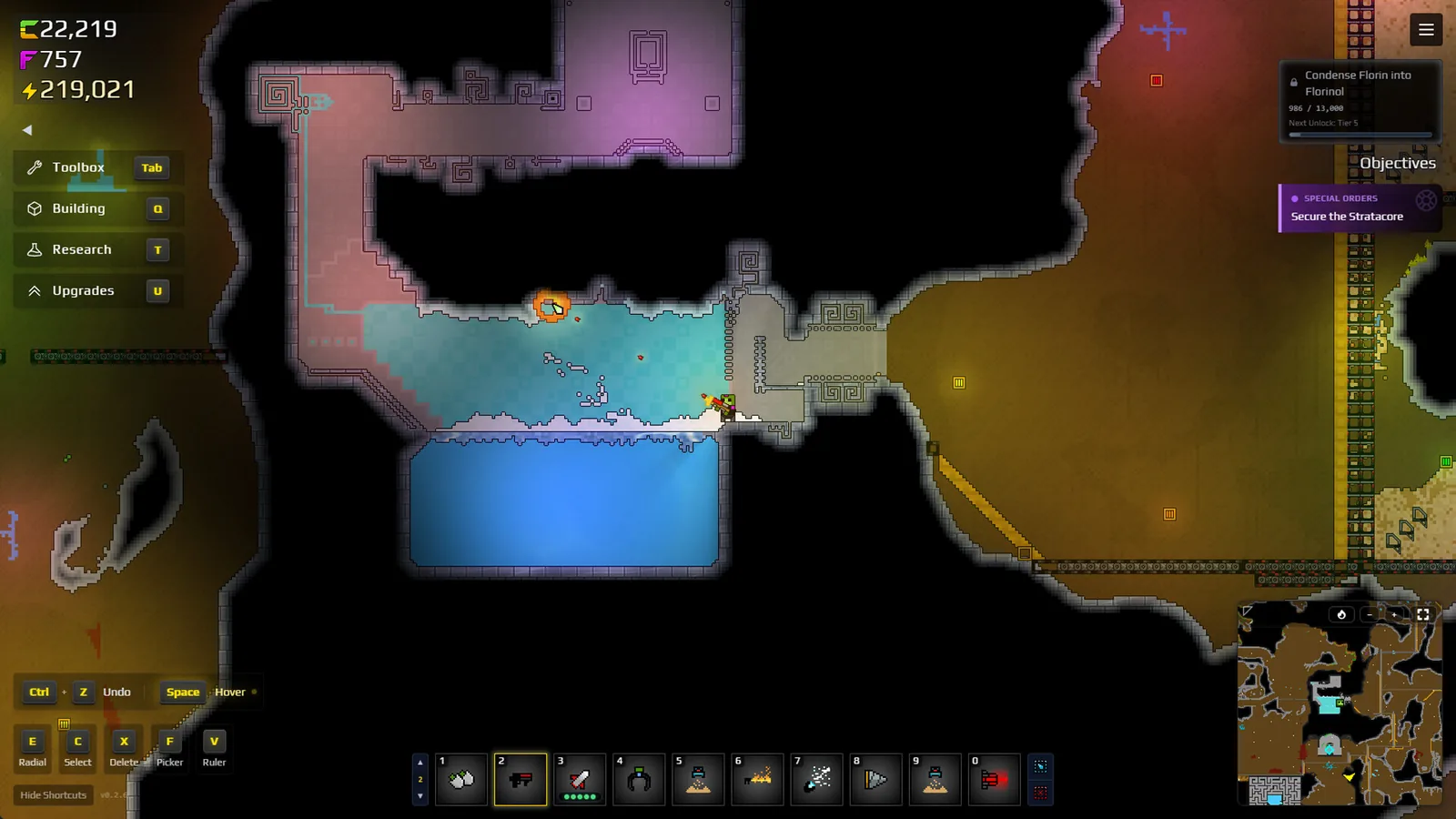 Official Sandustry promotional screenshot showing the player beside a contained underground Water reservoir.